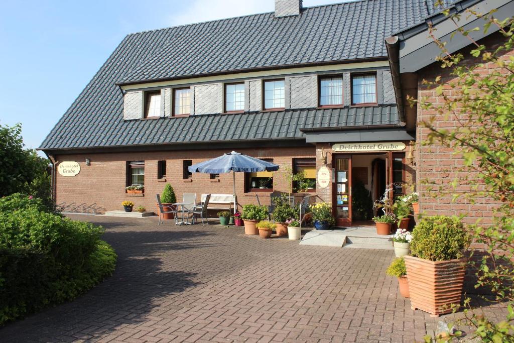 Deichhotel Grube Dorumer Neufeld Exterior photo